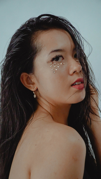 Woman Wearing Gold Jewel Makeup Woman Wearing Gold Jewel Makeup