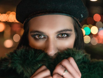 woman wearing green fur coat woman wearing green fur coat