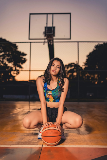 Woman Wearing Multicolored Floral Sport Bra Woman Wearing Multicolored Floral Sport Bra