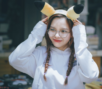 Woman Wearing Pikachu Alice Band Woman Wearing Pikachu Alice Band