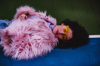 woman wearing pink fur woman wearing pink fur