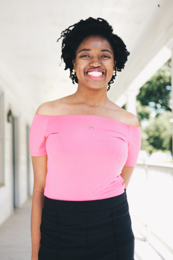 Woman Wearing Pink Tube Top and Black Bottoms
