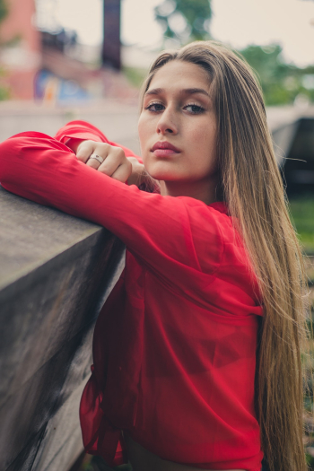 Woman Wearing Red Long-sleeved Woman Wearing Red Long-sleeved