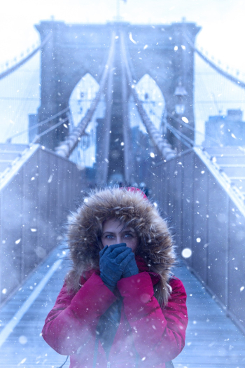 Woman Wearing Red Parka Jacket While Standing on Brooklyn Bridge Woman Wearing Red Parka Jacket While Standing on Brooklyn Bridge