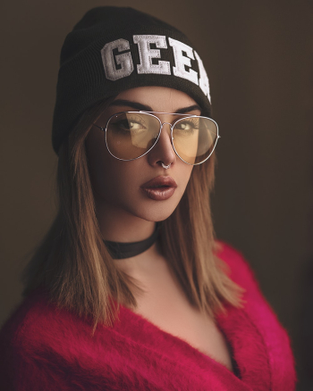 Woman Wearing Red V-neck Top And Eyewear Woman Wearing Red V-neck Top And Eyewear