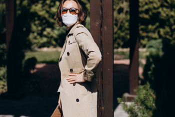 Woman wearing Trench-Coat, pose in the park, wear sunglasses, it's sunny Woman wearing Trench-Coat, pose in the park, wear sunglasses, it's sunny