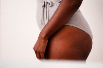woman wearing white bodysuit woman wearing white bodysuit