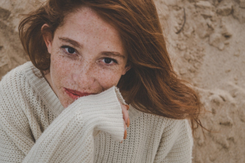 Woman Wearing White Knitted Sweater Woman Wearing White Knitted Sweater