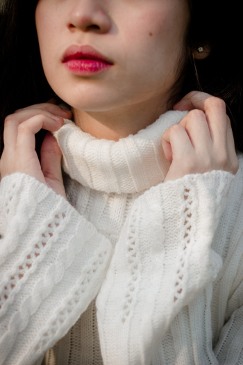 Woman Wearing White Knitted Sweater Woman Wearing White Knitted Sweater