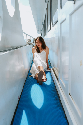 Woman Wearing White Spaghetti Strap Clothing Woman Wearing White Spaghetti Strap Clothing