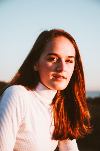 Woman Wearing White Turtleneck Sweater Woman Wearing White Turtleneck Sweater