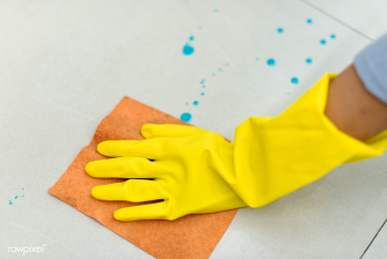 Woman wearing yellow rubber gloves and cleaning the surface | Free  photo - 2300059
