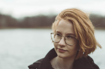 woman with blonde hair wearing eyeglasses woman with blonde hair wearing eyeglasses