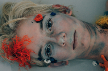 Woman With Face Paint on Her Face Woman With Face Paint on Her Face