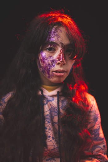 Woman With Purple Face Paint on Face Woman With Purple Face Paint on Face