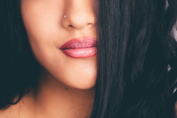 Woman With Silver-colored Nose Pin