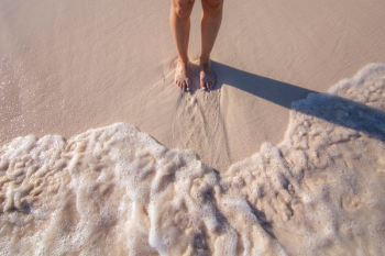 Womans Feet In Sand With Waves Womans Feet In Sand With Waves