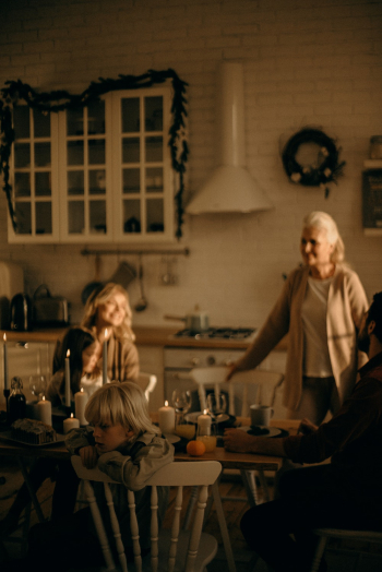 Women and Child Facing Dining Table Women and Child Facing Dining Table