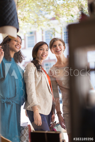 Women friends window shopping Women friends window shopping