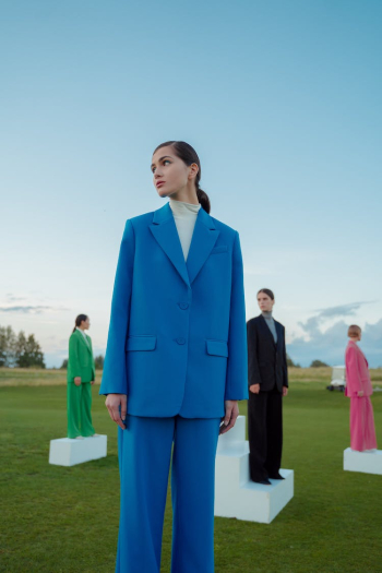 Women Wearing Suits Looking Away