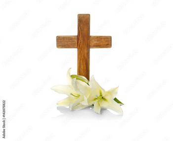 Wooden cross and lily on white background