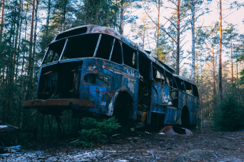 Wrecked Blue Bus In The Woods Wrecked Blue Bus In The Woods