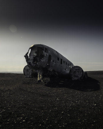 Wrecked Gray Airliner on Ground Wrecked Gray Airliner on Ground