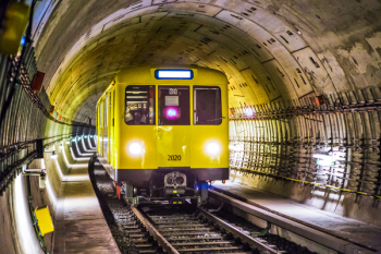 Yellow and Black Train Under Tunnel Yellow and Black Train Under Tunnel