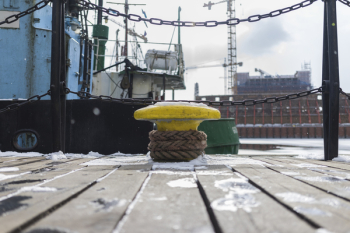 Yellow Anvil Beside Green Boat Yellow Anvil Beside Green Boat