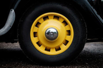 yellow vehicle wheel with tire yellow vehicle wheel with tire