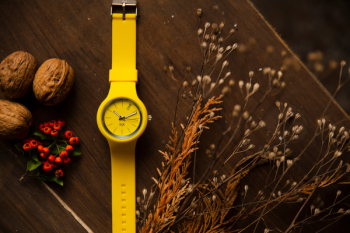 Yellow Watch on Tabletop Yellow Watch on Tabletop
