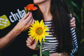 Young couple with sunflower Young couple with sunflower