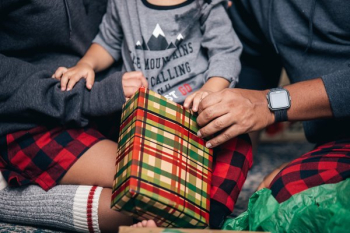 Young Family Opens Christmas Presents Young Family Opens Christmas Presents
