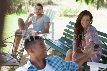 Young friends hanging out in backyard Young friends hanging out in backyard