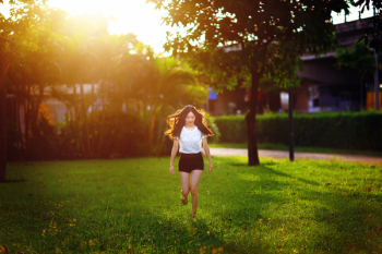 Young girl jump on grass Young girl jump on grass