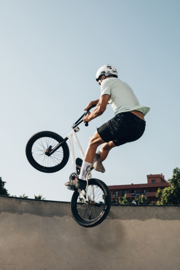 Young man extreme jumping  with bicycle Free Photo