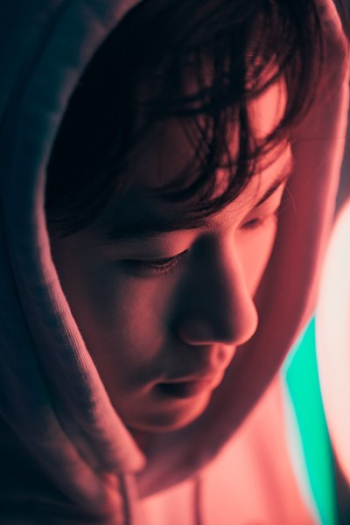 Young Man Porotrait In Pink Light Young Man Porotrait In Pink Light