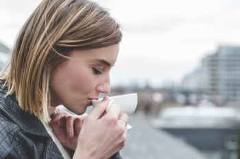 Young Woman Drinking Tea Young Woman Drinking Tea