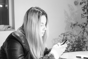 Young Woman Using Mobile Phone Young Woman Using Mobile Phone