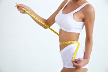 Young woman with beautiful body and measure tape Free Photo Young woman with beautiful body and measure tape Free Photo