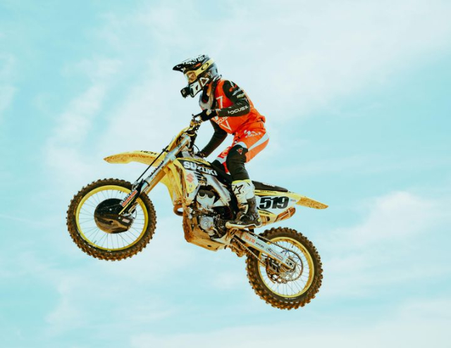 Action-Packed Motocross Rider in Midair