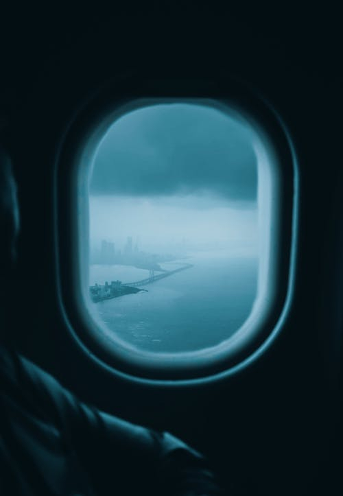 Airplane Window View of White Clouds · Free Stock Photo