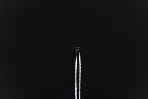 airplane with white smoke
