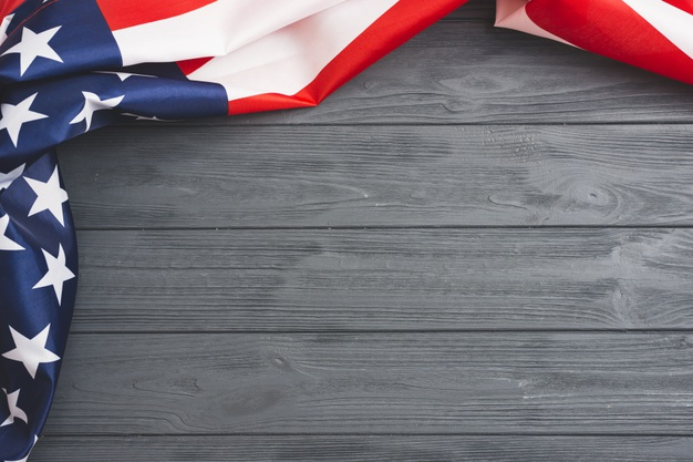 American flag on gray wooden background Free Photo