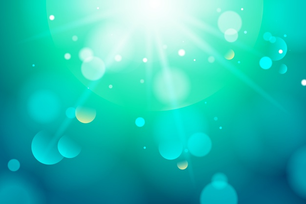 Blue gradient background with bokeh effect Free Vector
