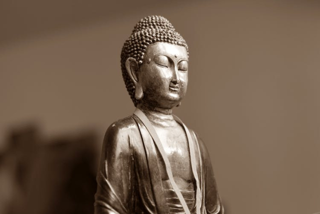 Brown Ceramic Chinese Figurine