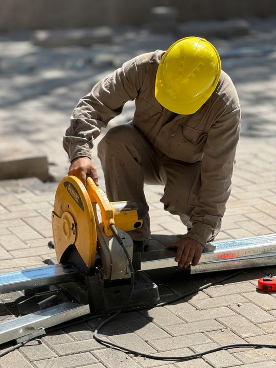 Construction Worker Using Circular Saw