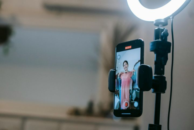 Content Creator Setup with Smartphone and Ring Light