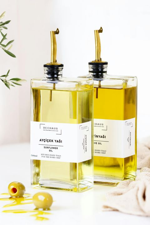 Elegant Olive Oil Bottles on a Minimalist Kitchen Counter