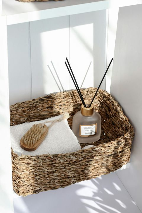 Elegant Rustic Home Decor with Woven Basket and Aromatherapy